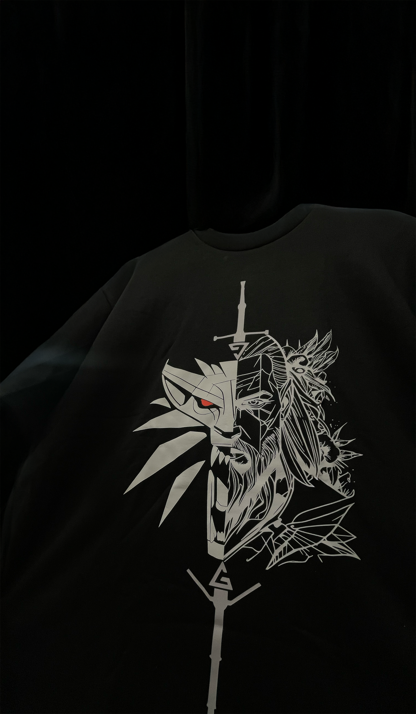 black witcher oversized t shirt, front half view from bottom